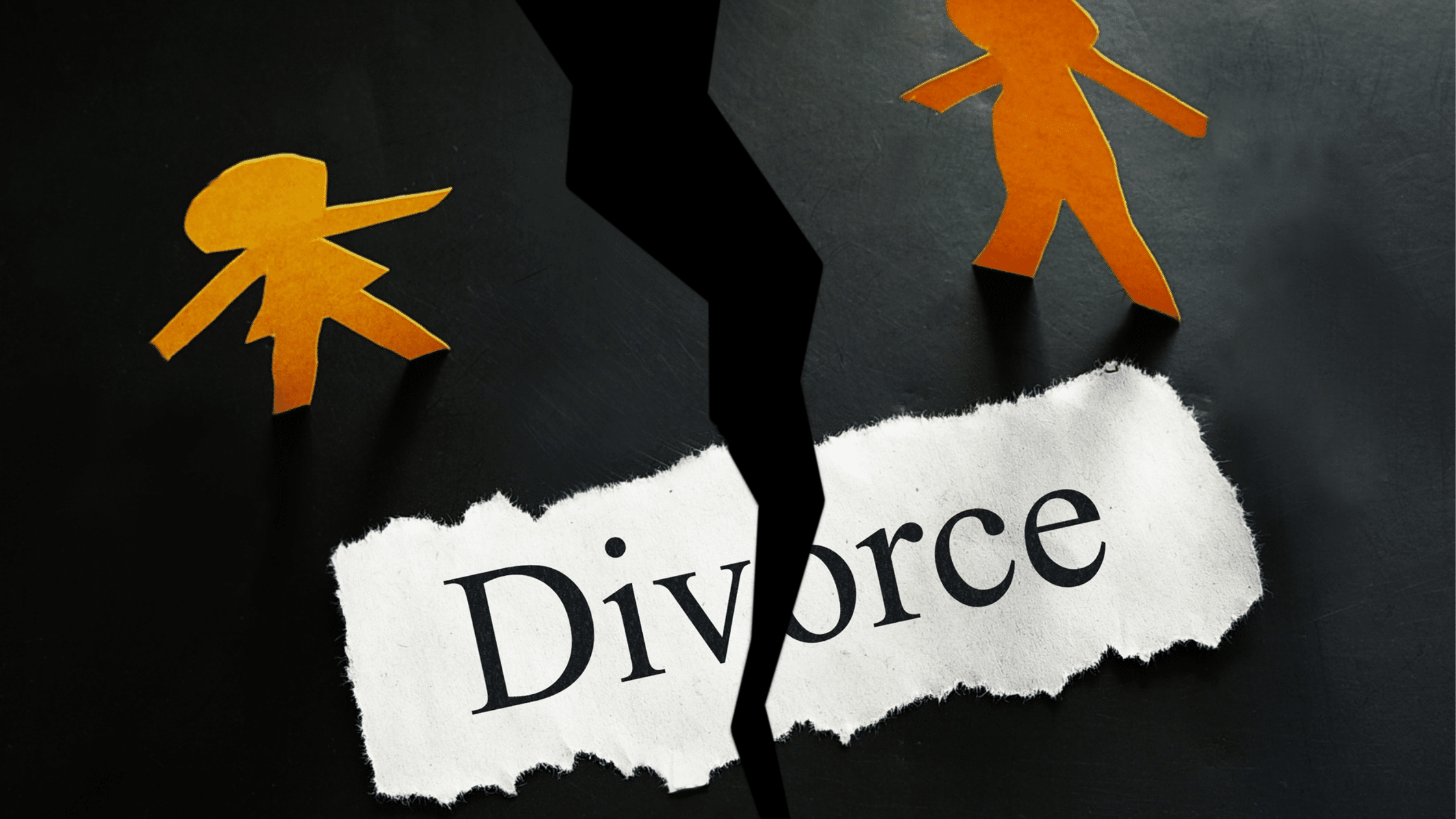 ripped divorce sign with cutouts of man and woman